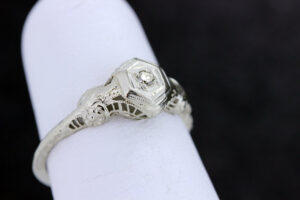 Timekeepersclayton 14K Gold thin band Solitaire with a Diamond Center and Daisy Accents