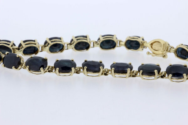 Timekeepersclayton 14K Yellow Gold Bracelet with Blue Oval cut Sapphires