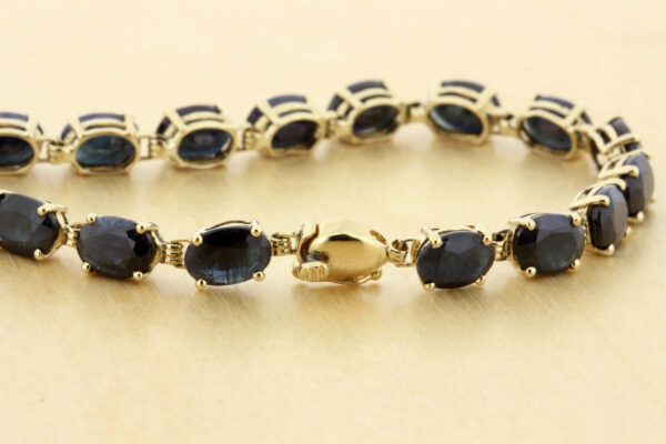 Timekeepersclayton 14K Yellow Gold Bracelet with Blue Oval cut Sapphires